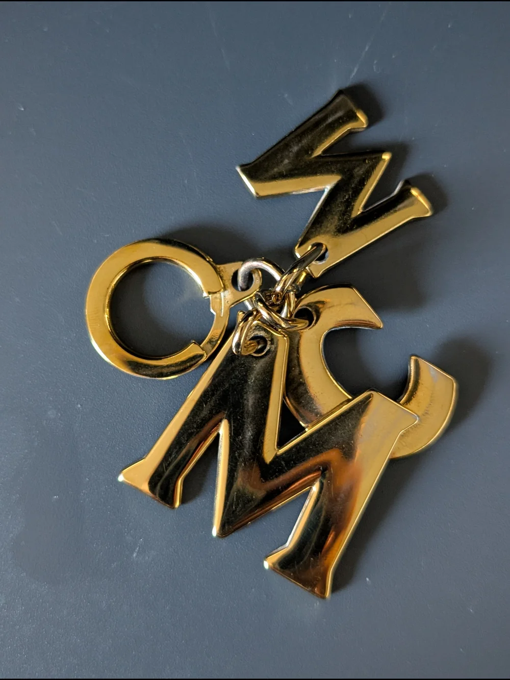 MCM Gold Tone Logo Letter Keychain Charm